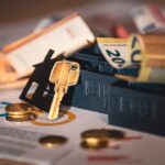 Close-up shot of a magnifying glass hovering over a document, symbolizing the scrutiny of a real estate contract, with hou...